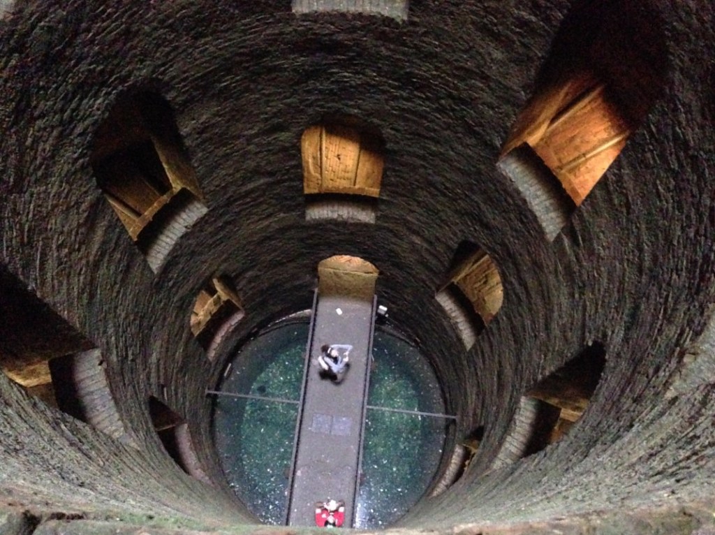 A picture containing sitting, trunk, brown, old

Description automatically generated